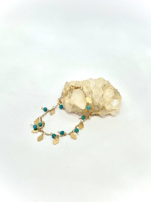 Pulsera para dama elaborada con piedra turquesa y mano de fátima